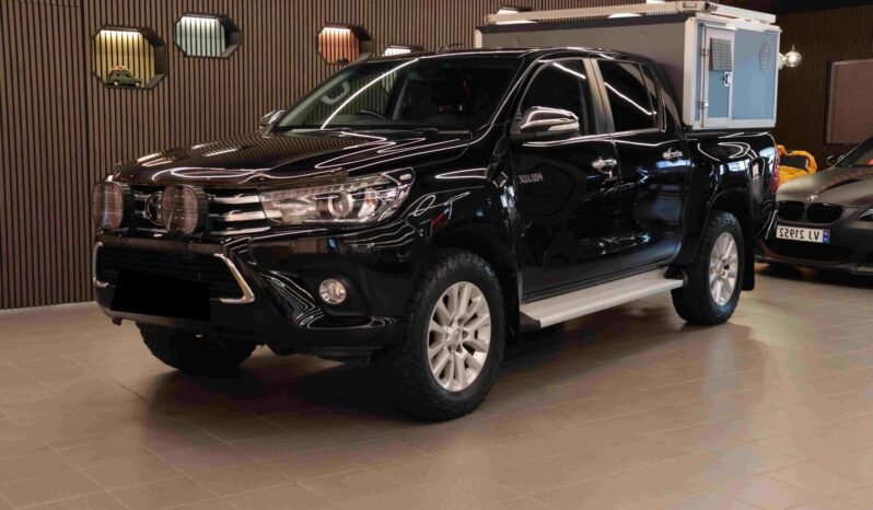 
								Toyota Hilux 2.4 D-4D 150 ch 4×4 | Double Cab | 5 places | Cuir | Caisse pour chiens | Crochet | Chauffage électrique full									