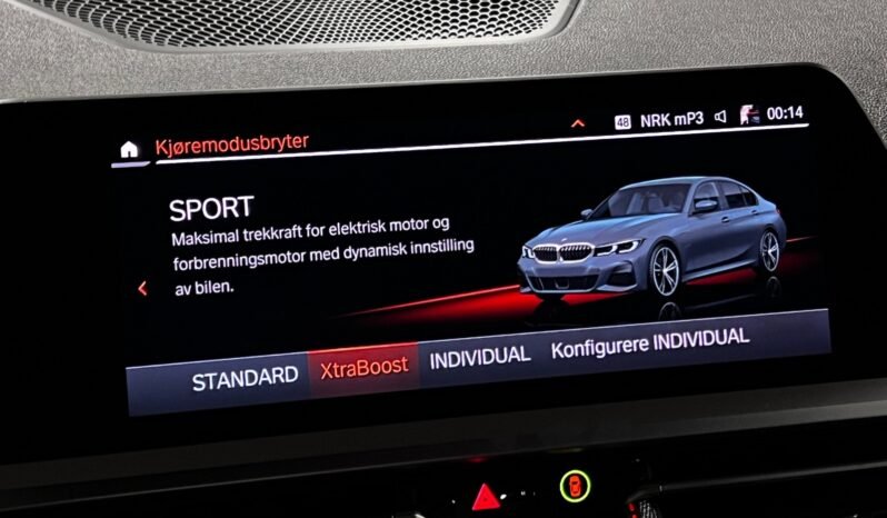 
								BMW 330e M Sport — 2020 full									
