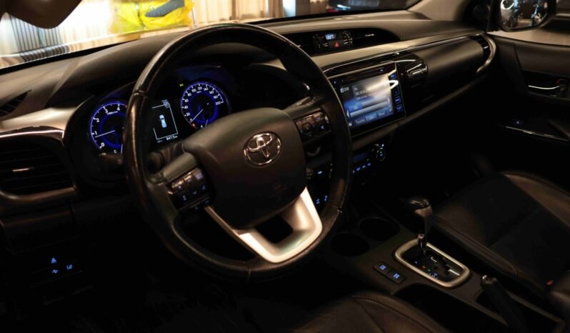 
								Toyota Hilux 2.4 D-4D 150 ch 4×4 | Double Cab | 5 places | Cuir | Caisse pour chiens | Crochet | Chauffage électrique full									